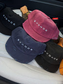 All four EVD 5-Panel Short Brim Caps