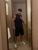 Adam wearing the EVD 5-Panel Short Brim Cap in Black / White